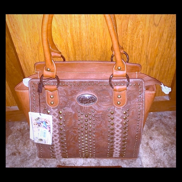 Montana West Handbags - Genuine leather concealed carry purse NWT